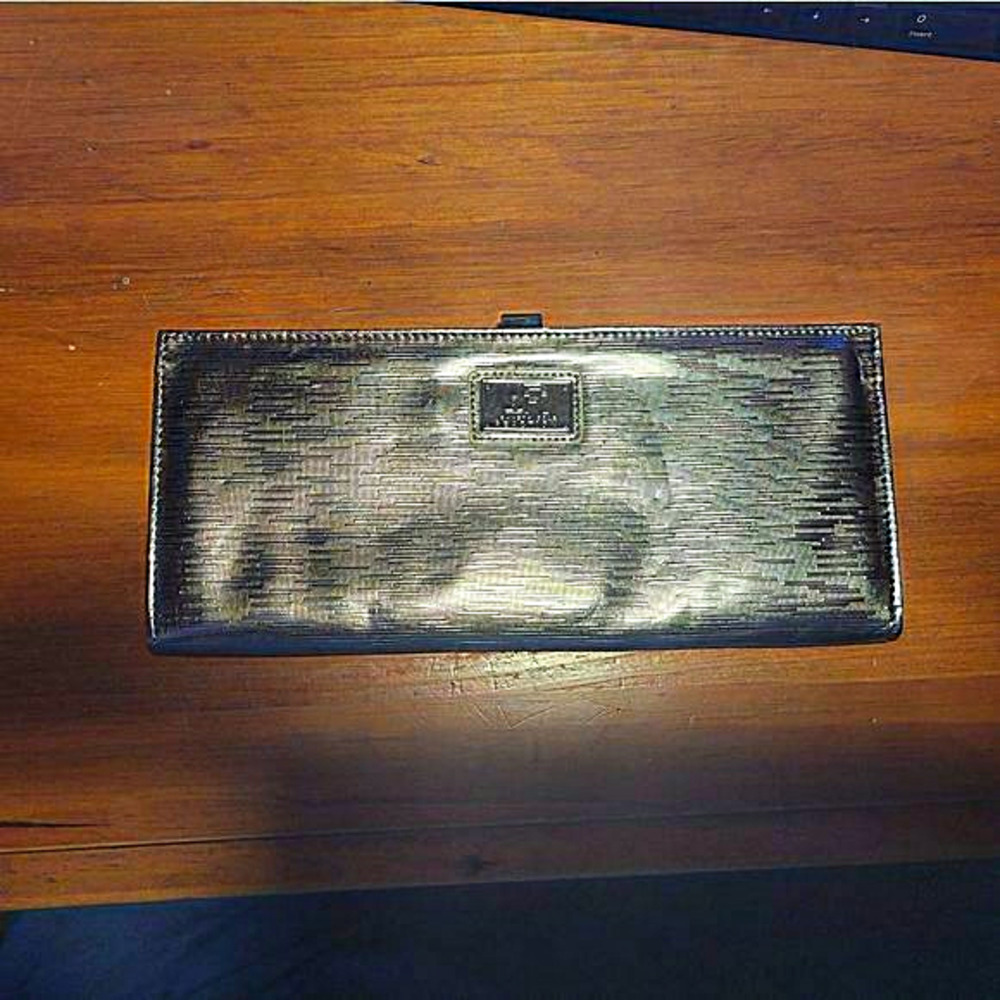 Kennethcole Reaction Clutch